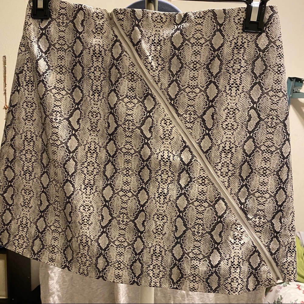 asymmetrical zip up snakeskin skirt